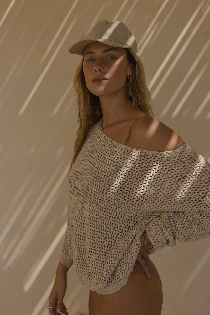 A Model Wearing a Natural Summer Cotton Knit