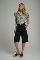 A woman wearing a cotton check top in Australia