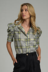 A model wearing a vintage inspired cotton check blouse