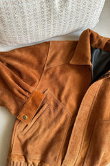 Brown suede jacket with collar and panel details in a bomber jacket style