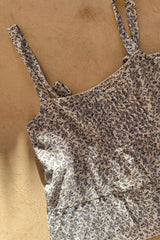 Lightweight summer top with pintuck detailing and feminine shape 
