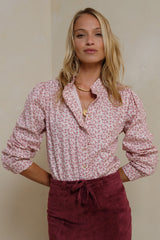 Soft floral blouse with button front and gentle frill collar