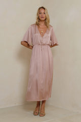 Deep V-neckline detail on Lyra Dress