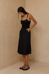 Lightweight cotton dress with adjustable shoulder ties and pockets 