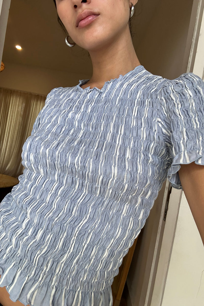 Raincloud blue ruched top by Lilya
