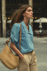 Side view of blue fashion chambray shirt by Lilya