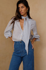 Blue stripe blouse styled casually with jeans