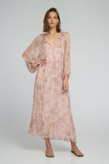 Model wearing the Monet print Verbena Dress by LILYA 