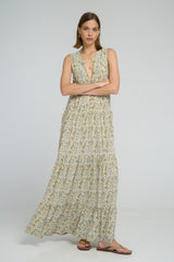 Model wearing Calvi Dress Fleur Des Champs, relaxed sleeveless maxi dress.