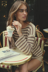 A model wearing the Collectiva Knit Top by Lilya