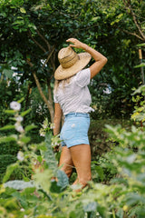 Chamomile Short in Light Denim with a high-rise waist and fitted silhouette.