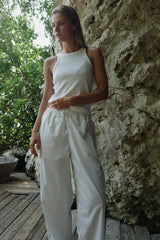 Breathable relaxed pants offering soft structure and easy wearability