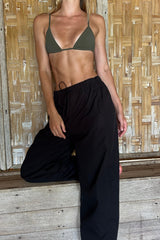 Black Coconut Pants in lightweight Meridian cotton with a relaxed straight-leg silhouette and elasticated waistband.
