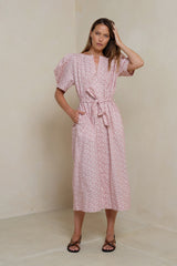 Floral midi dress with puff sleeves styled for Australian seasons