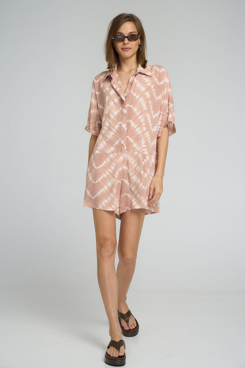 Playsuit highlighting the flowy silhouette and tie dye print