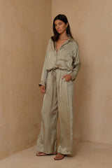 Desert Sage satin pants with relaxed wide-leg silhouette and soft drape 