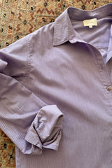 Soft cotton oversized shirt layered casually for warm weather style