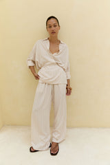 Wide-leg striped pants in natural tone