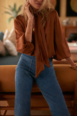 Silk-touch rust blouse with tie