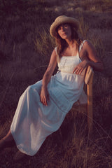 Woman wearing the Elena Ivory relaxed lace maxi dress