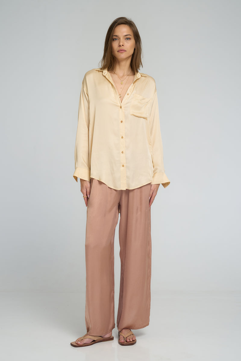 Front view of LILYA Fenton Pant in rose bisque wide leg