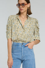 Close-up of billowy sleeve detail on the Woodford Blouse by LILYA