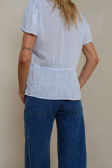 Close up embroidery detail powder blue Monty blouse