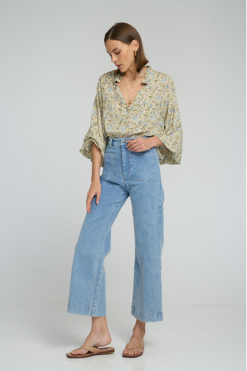 Model wearing Molly Denim Jean in Pale Blue 
