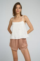 Front view of Icaria Top in White with pintuck and lace detailing