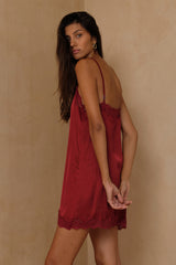 Soft satin mini dress with lace trim and adjustable fine straps