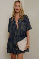 Button-through mini dress with drop waist by LILYA