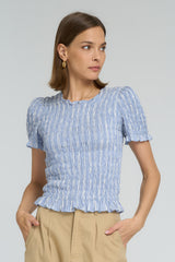 Ruched short sleeve chambray top paired with relaxed sand trousers