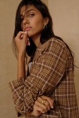 Relaxed Sand Plaid blazer styled casually with matching tailored shorts