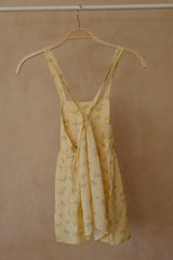Detail picture of the back tie detail on the Lila Kids Dress. 