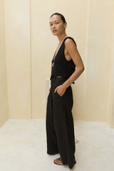 Side view of black linen pant with pockets