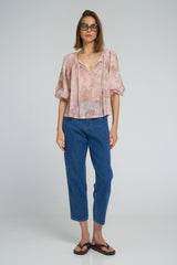 LILYA Etta Top styled with jeans, showing its loose feminine fit
