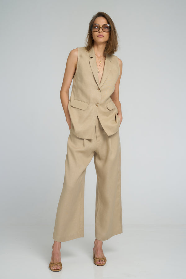 Close-up of tailored pleats and zip front on Scorpio Pant