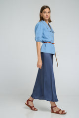 Side view of the blue midi-length Lunar Skirt