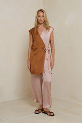 Close-up of tie closure on LILYA wrap mini