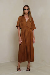Front view of flutter sleeve Rust dress