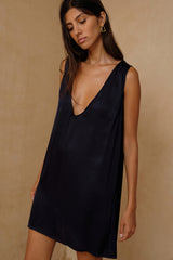 Navy satin mini dress with relaxed A-line silhouette and soft drape 