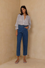 High-waisted jeans with straight leg silhouette and vintage feel 