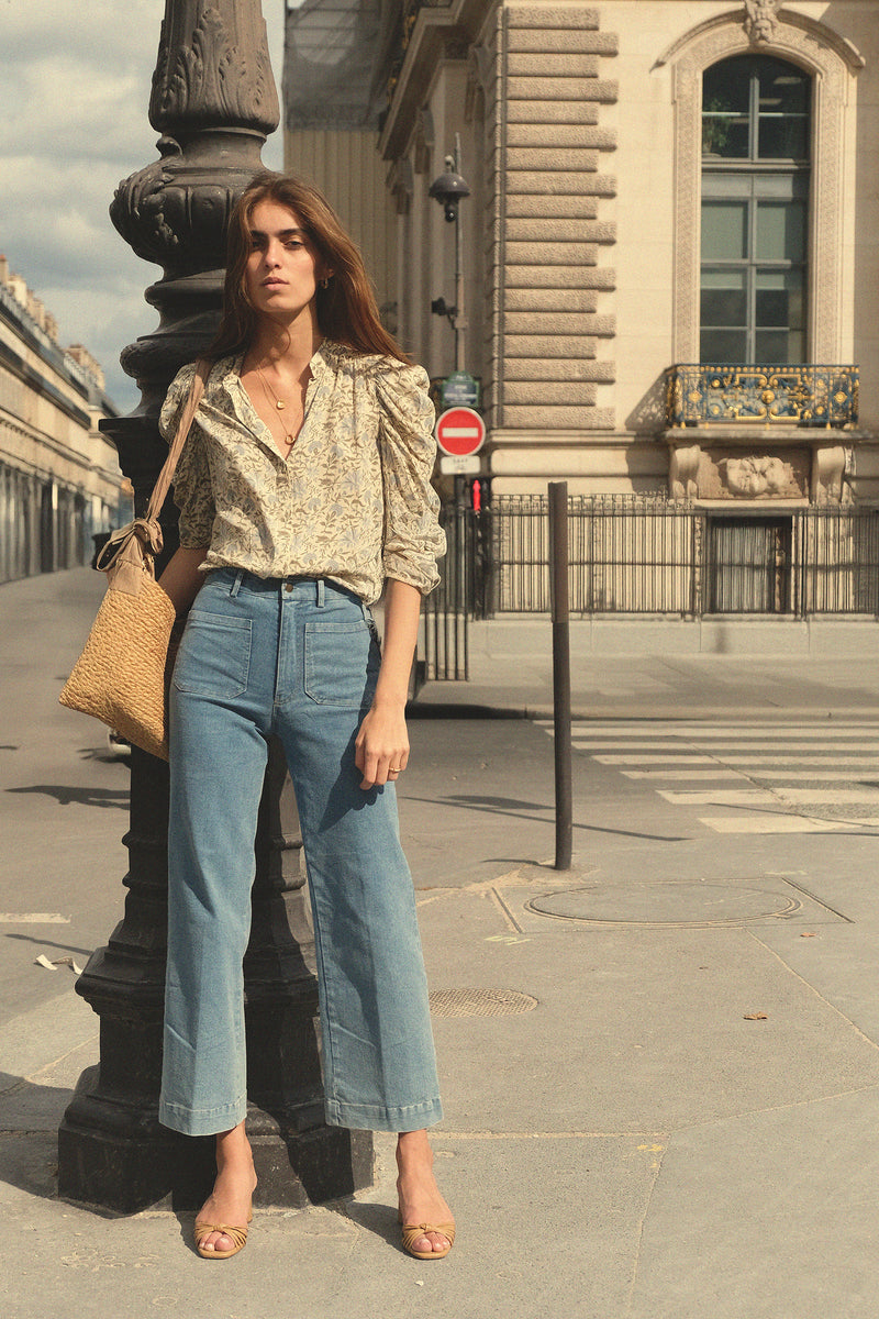 70s style high waisted pale blue jeans