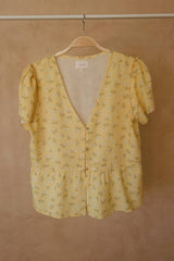 Detail of the soft gathers through the shoulders on the Monty Top in Yarrow Yellow for the JKB x Lilya Collaboration. 