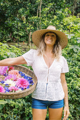 Jess wears the white summer Monty Top by LILYA