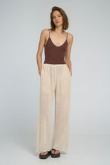 Fenton Natural pants styled over brown swimwear