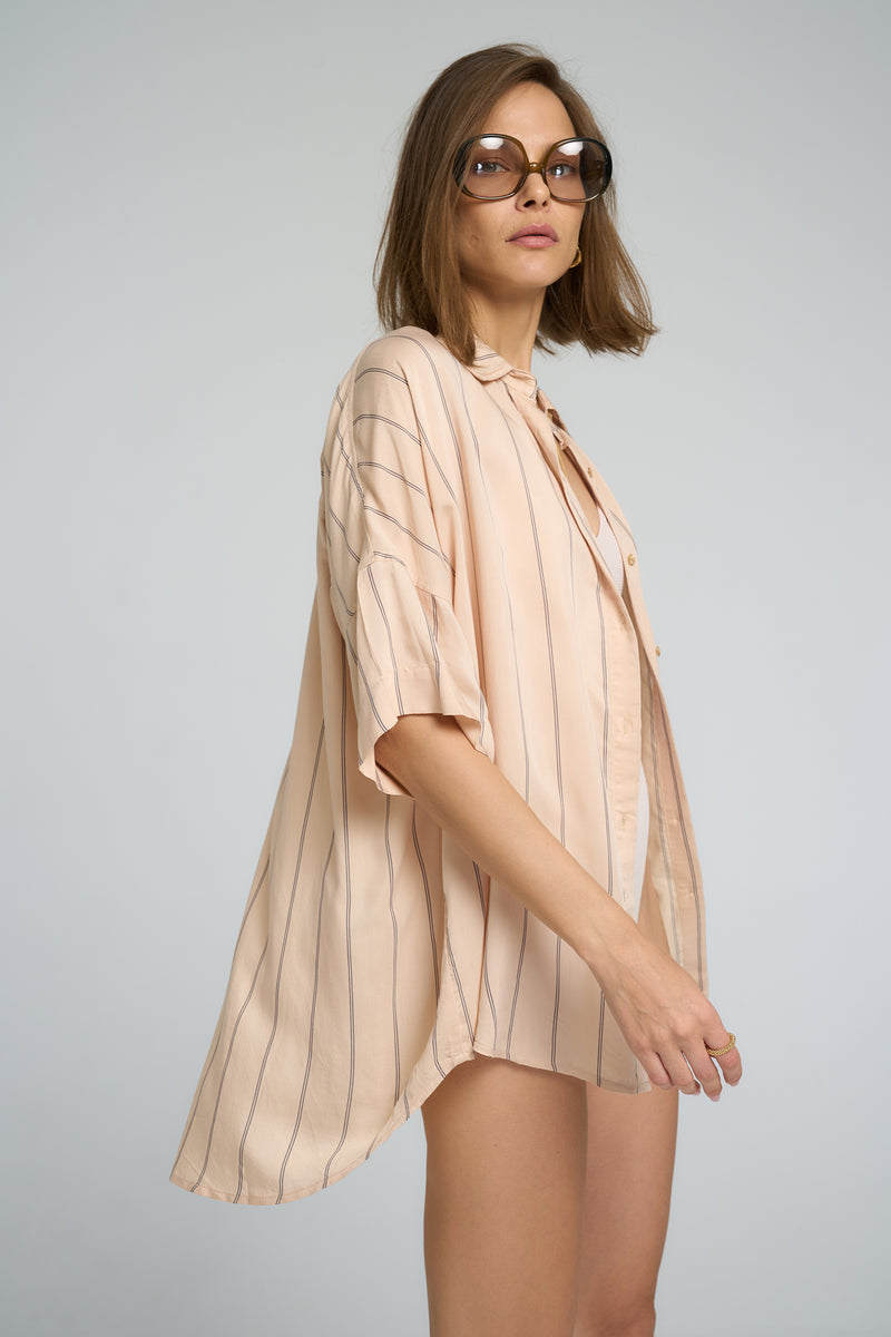 Georgie Shirt styled as a beach cover-up over swimwear