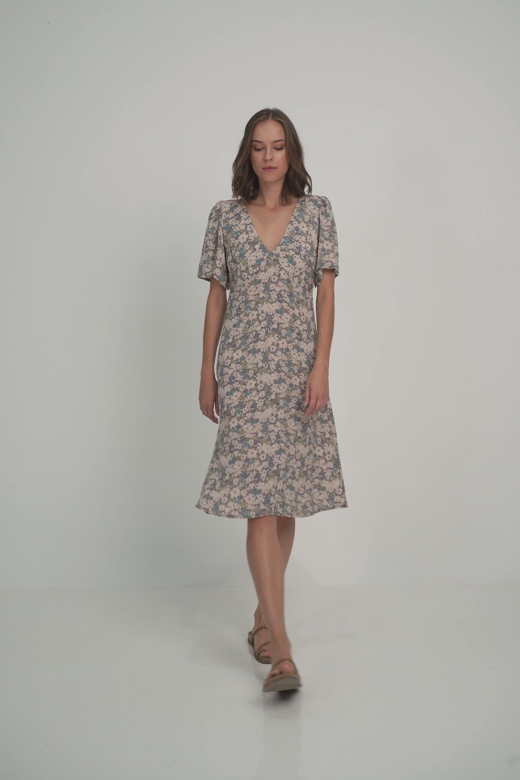 A Woman Wearing a Summer Floral Midi Dress