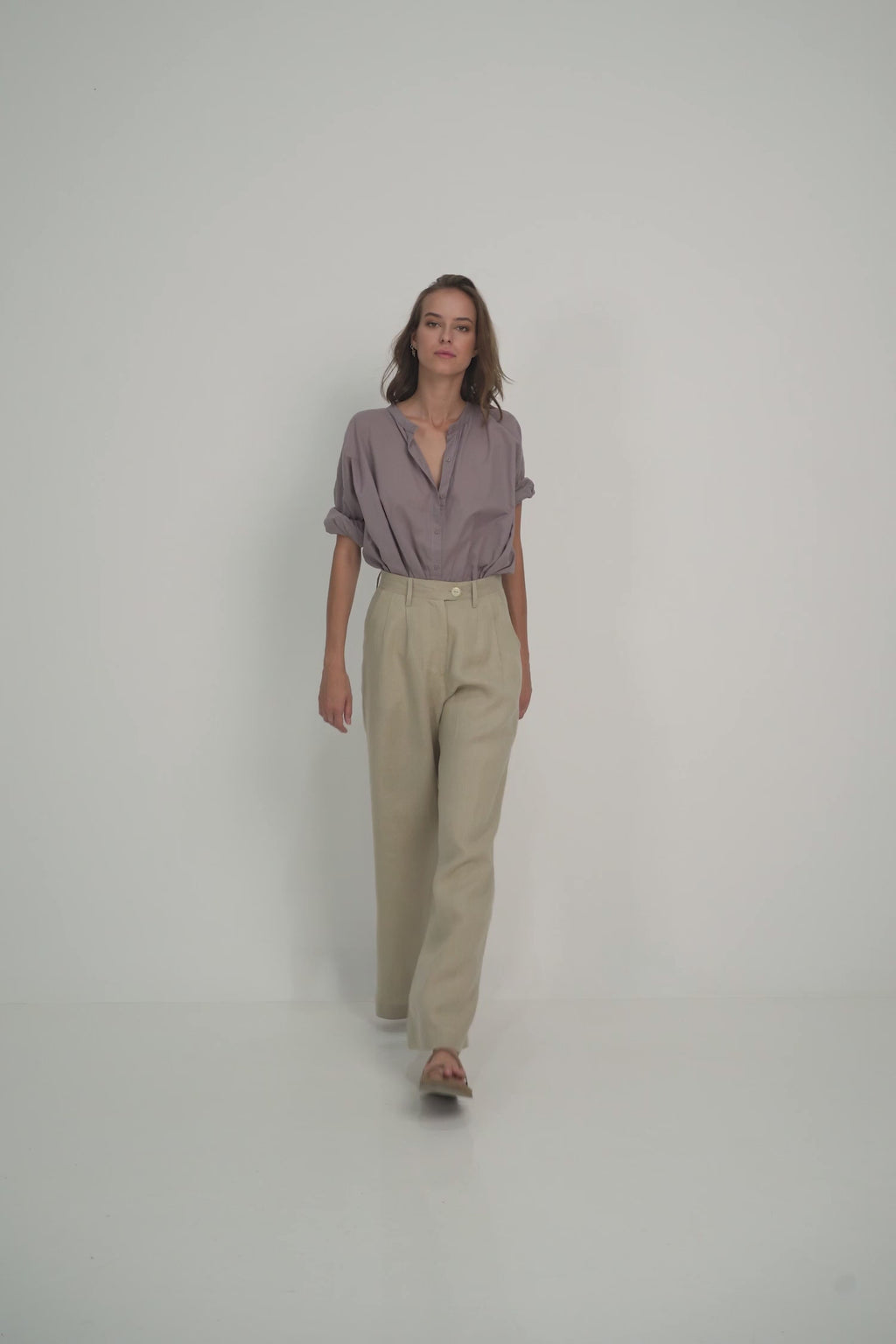 A Woman Wearing Natural Linen Flared Pants in Australia