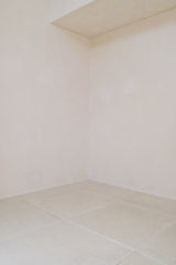 Side view showing lightweight drape of blouse